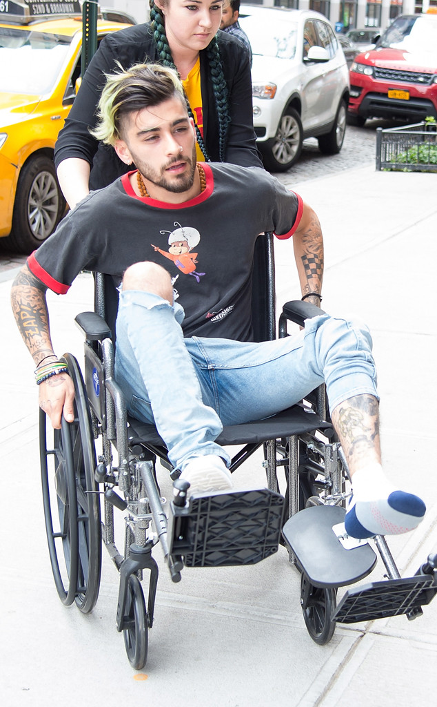 zayn malik spotted in wheelchair after injury e news